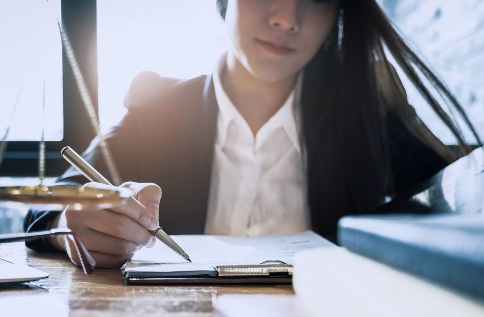 Photo of a woman taking notes